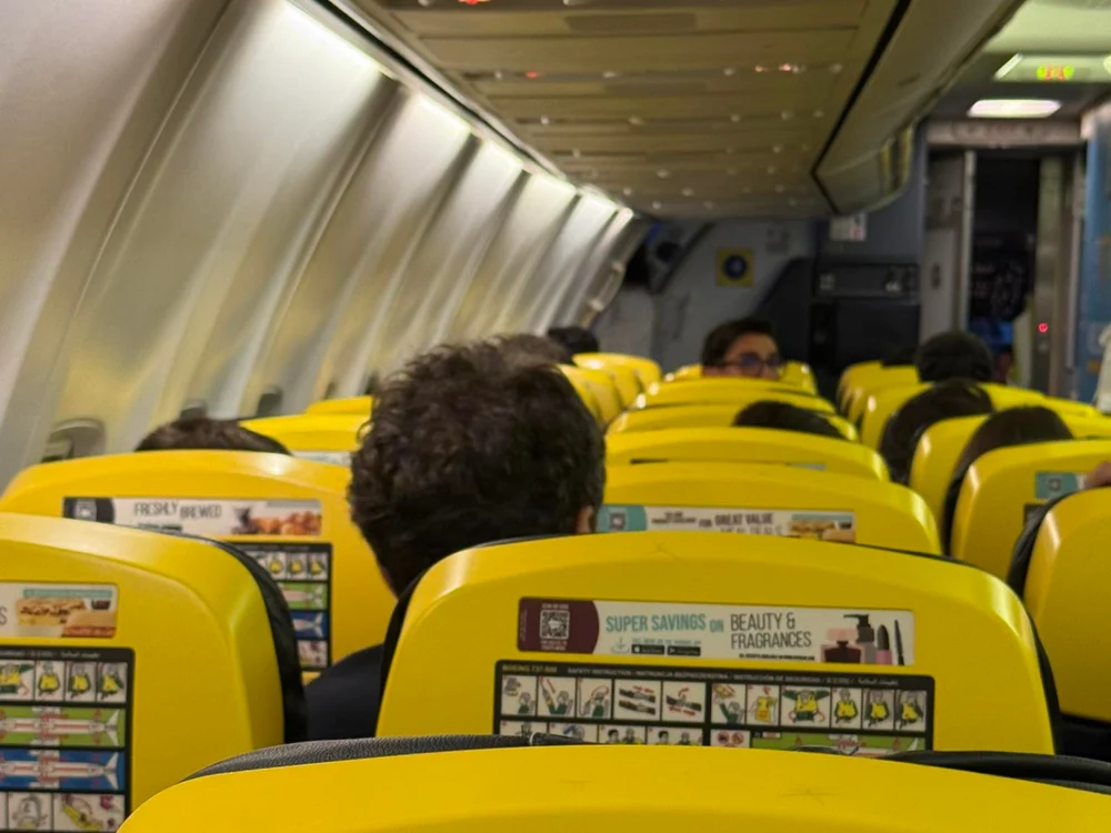 Președintele Nicușor Dan, surprins la „low cost” de o româncă. Unde a zburat șeful statului